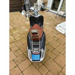 Scooter met windscherm