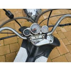 Scooter met windscherm