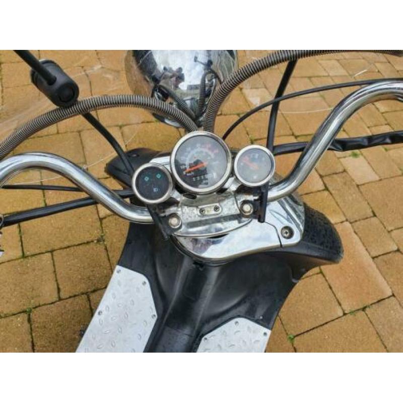 Scooter met windscherm