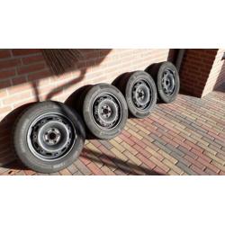4 stalen velgen + Continental zomerbanden