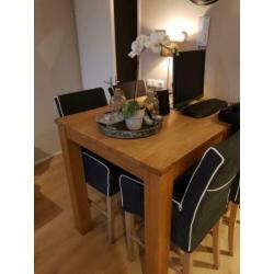 Teakhout eettafel met 4 stoelen