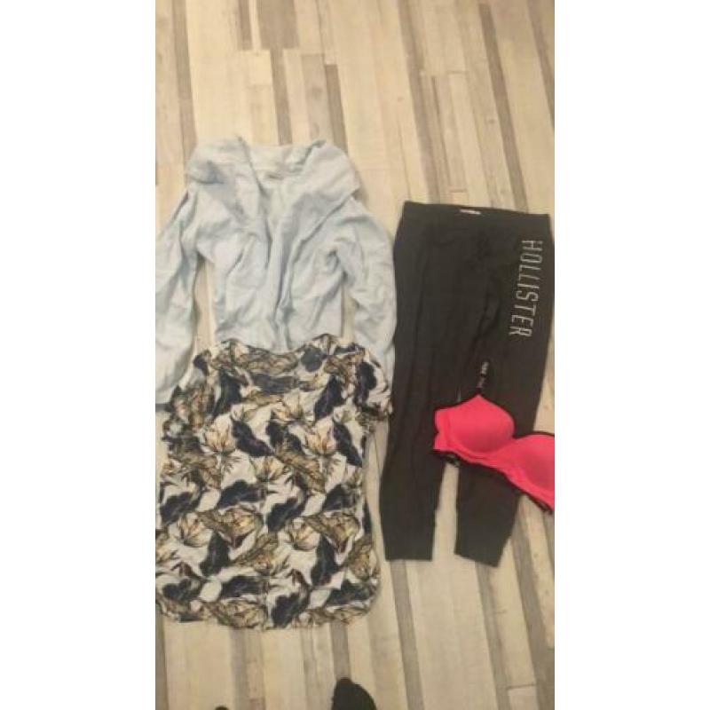 Tas vol kleding maat L/XL broeken tops vesten Jas enz