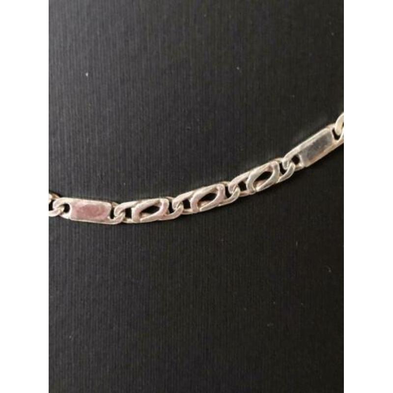 Zilveren ketting met massieve/valkenoog schakels