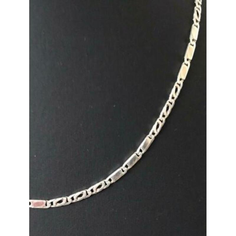 Zilveren ketting met massieve/valkenoog schakels