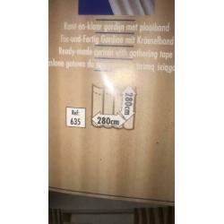 2 pakken nieuwe gordijnen
