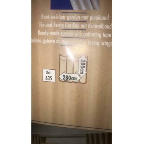 2 pakken nieuwe gordijnen