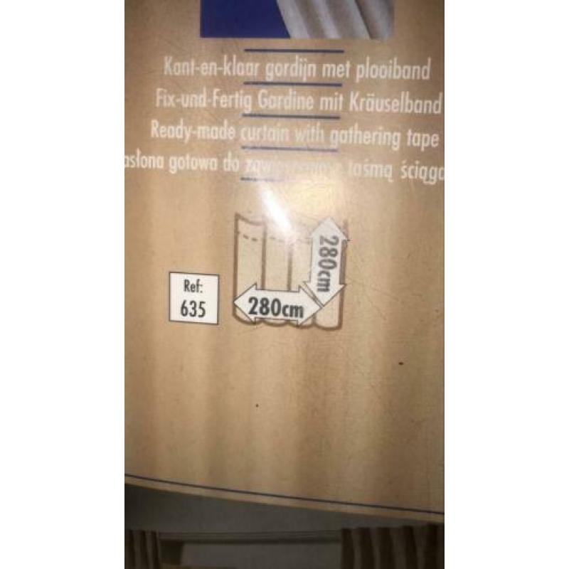 2 pakken nieuwe gordijnen