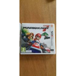 Nintendo 2DS met 3 spellen en oplader.